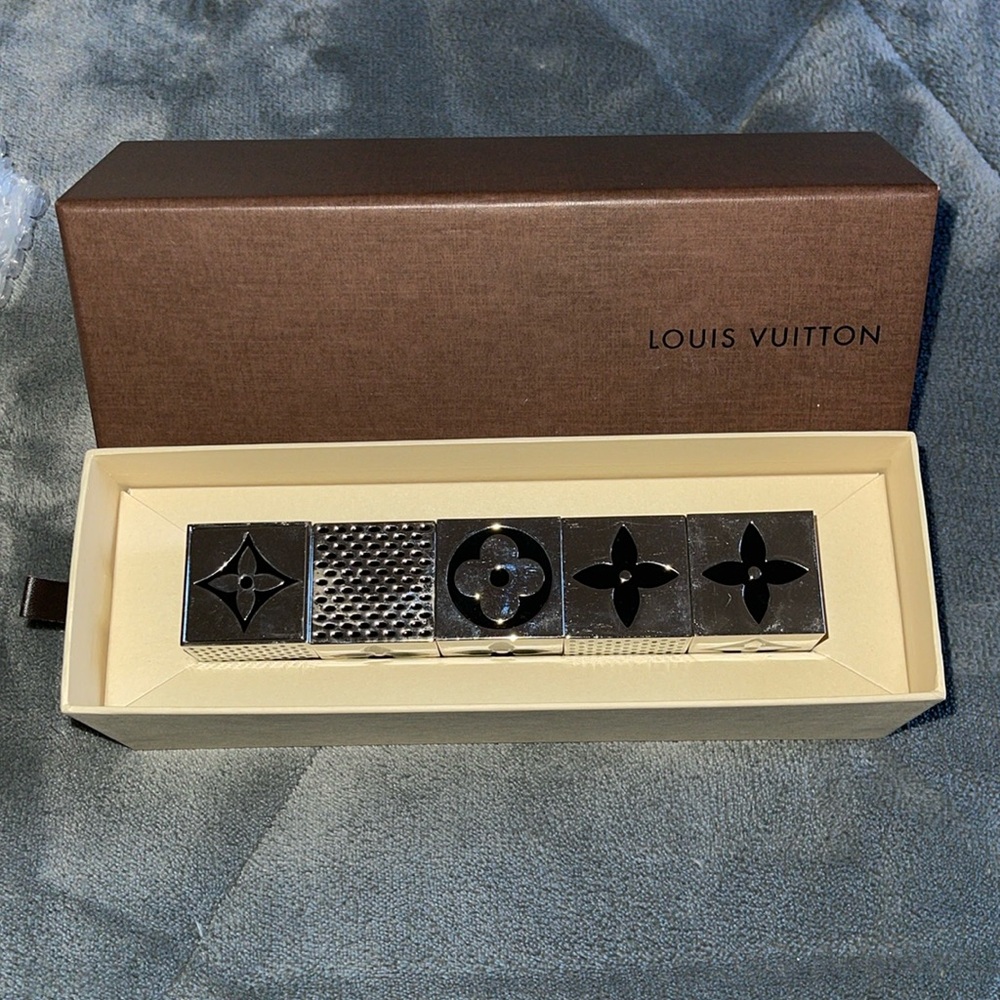 Preloved Louis Vuitton limited edition silver magnetic dice cubes. Size 1 1/4”